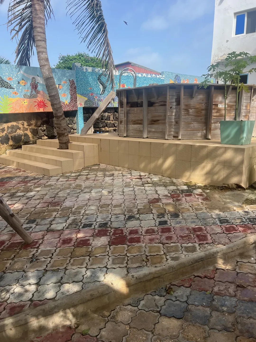 Colorful mosaic wall on Ngor Island.