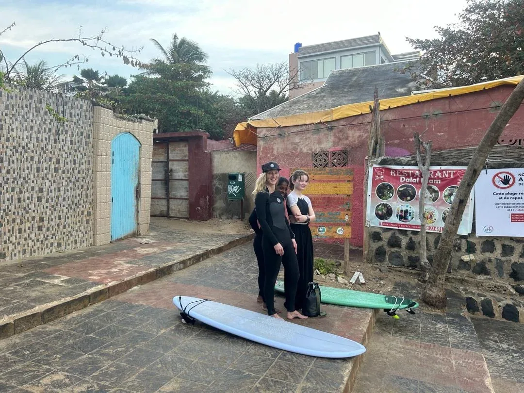 Surfers ready for a day on Ngor Island.