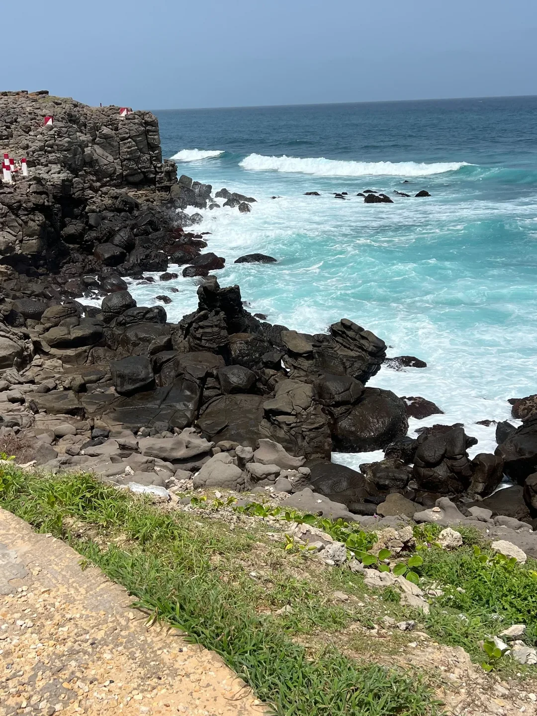 Rocky coastline with crashing waves.