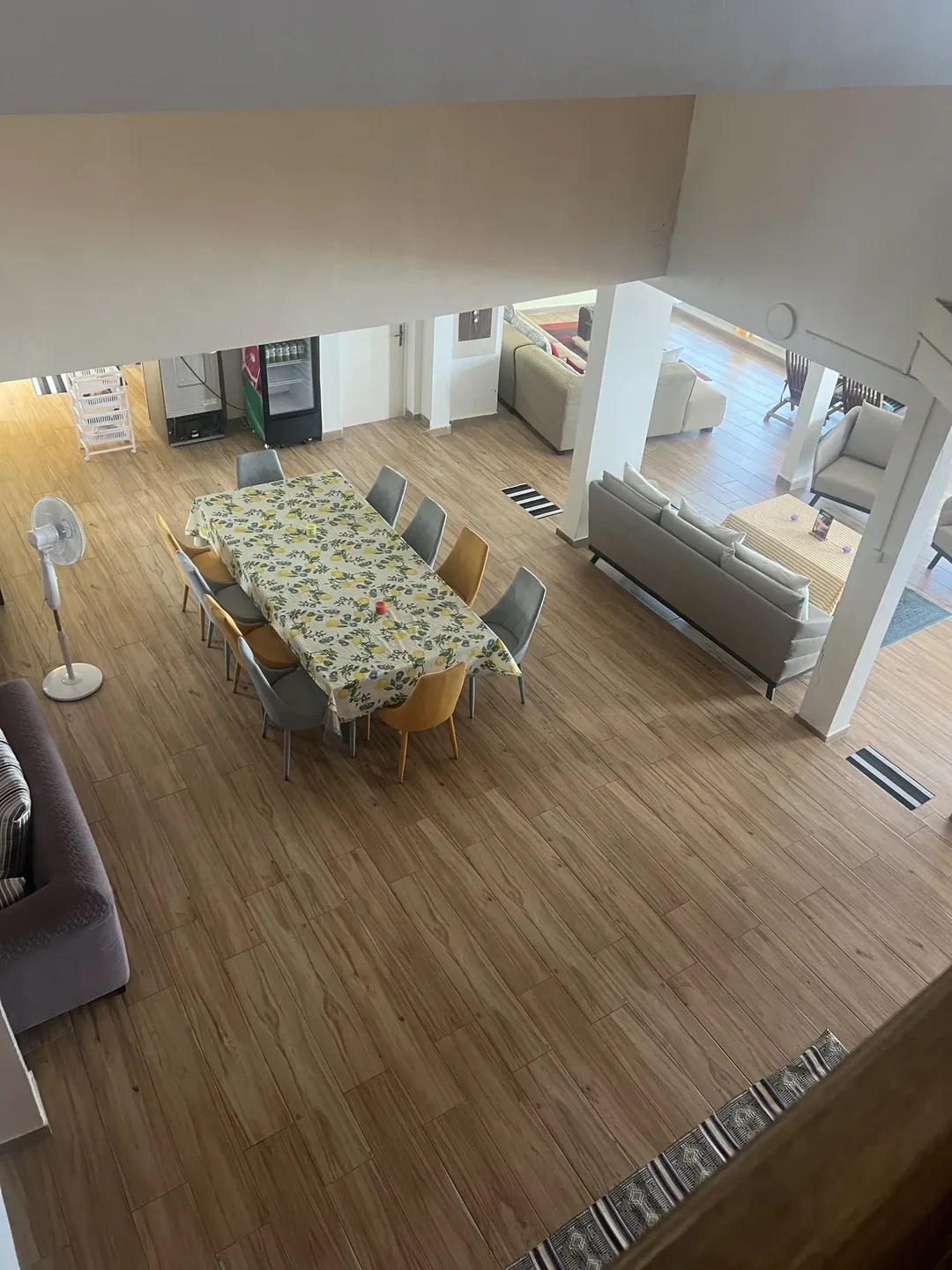 Spacious dining area with modern decor.