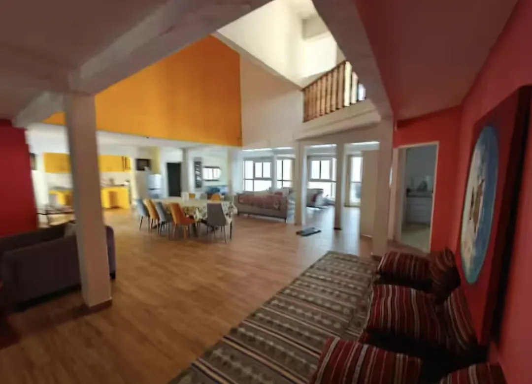 Spacious interior of the surf camp house.